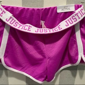 NWT, Justice, purple active shorts.